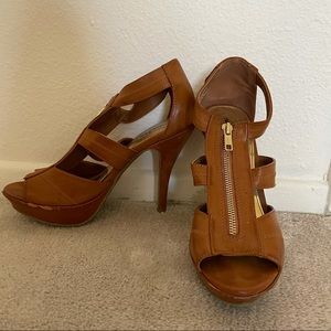 Tan strappy heels with zipper
